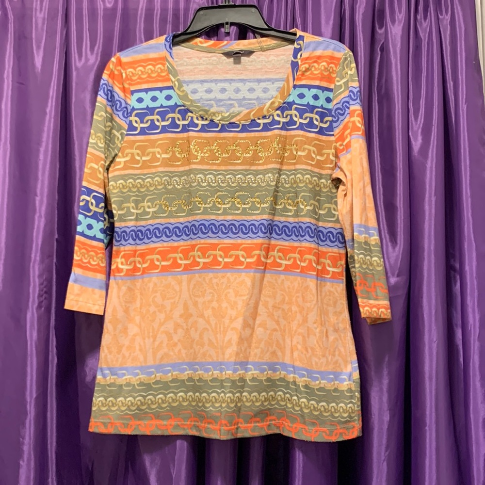 I Love this blouse, I wore it a few times,to small for my belly area, very soft